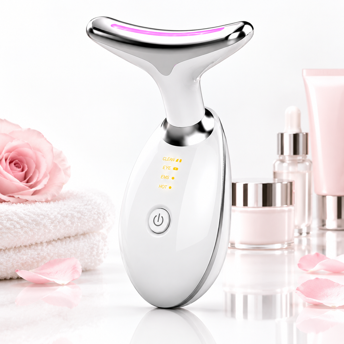 Close-up of the NeckGlo chrome T-shaped beauty head with soft pink LED light